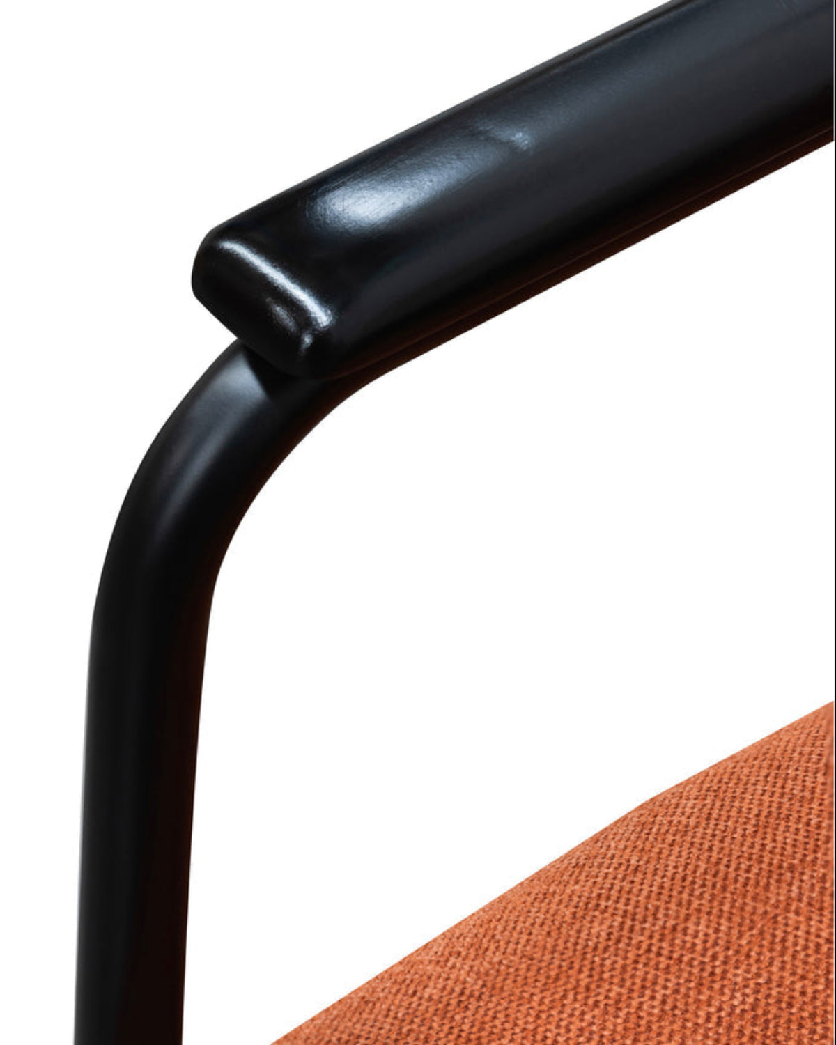 Close-up of a black metal armrest and orange fabric seat on a chair.