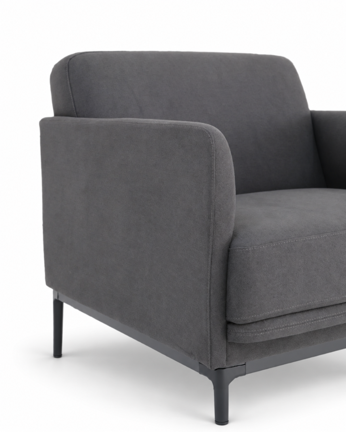 A modern gray upholstered armchair with dark tapered legs, shown from a three-quarter angle against a plain white background.