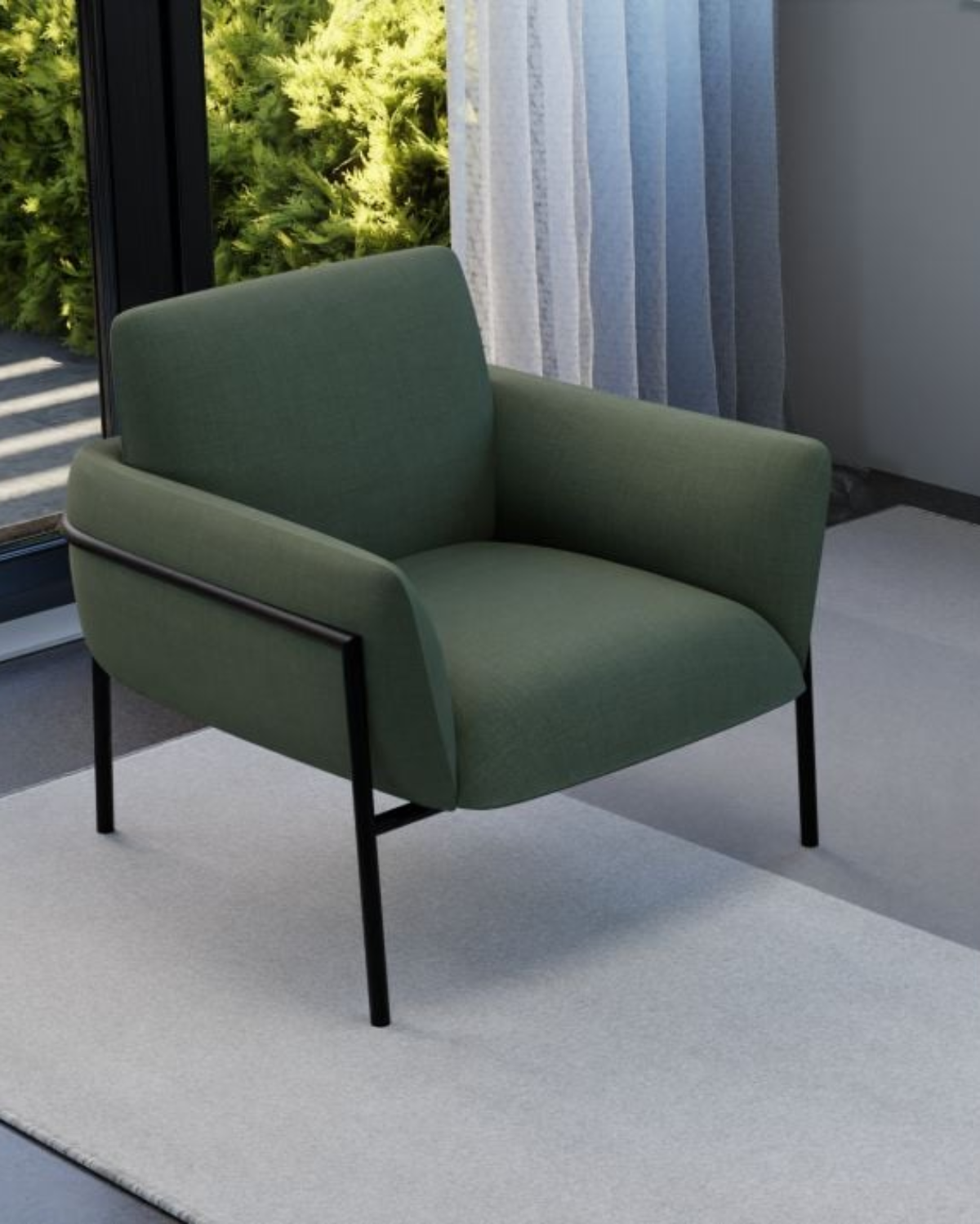 Green armchair in a modern living room with a small table and cup.