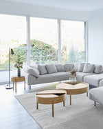 Arc Side Table in oiled oak styled in modern living room — Scandinavian furniture piece with rotating lid and hidden storage.