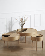 Close-up of Arc Side Table’s solid oak three-legged base showing geometric Scandinavian design
