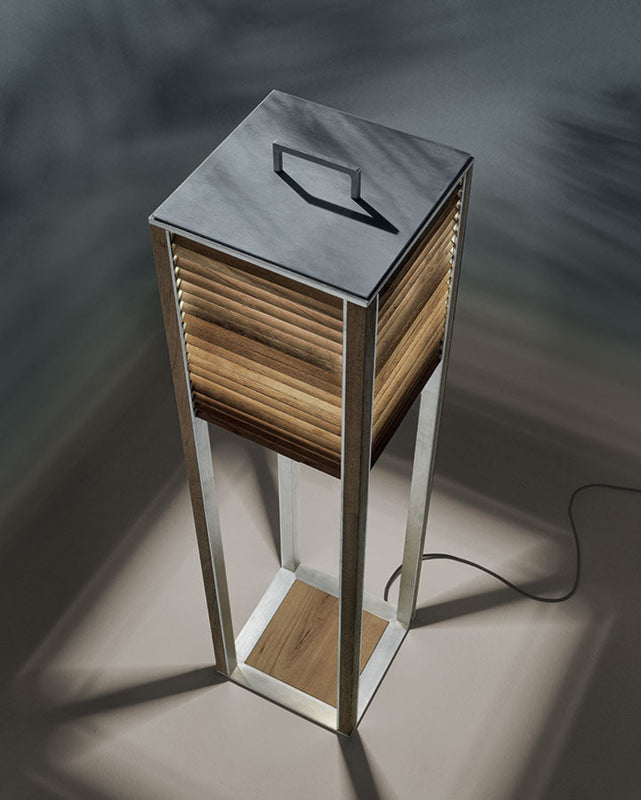 Top view of ginger tall lamp in aluminium and natural teak frame.