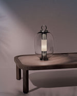 Lucerna table lamp in transparent glass and aluminium frame.
