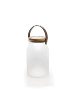 Milk Solar Lamp with a glass white acid-etched casing and natural teak frame.