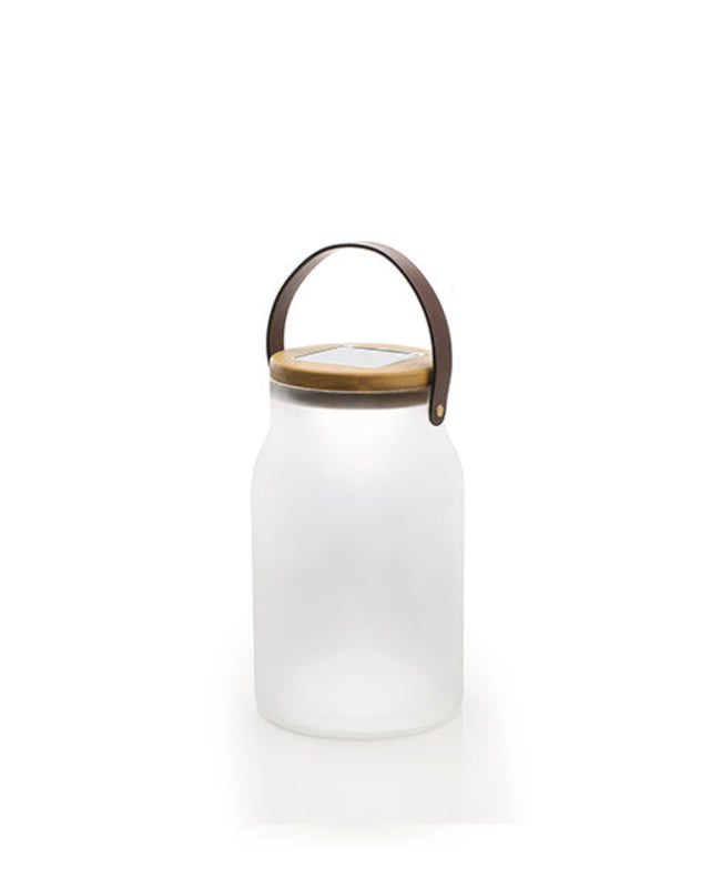 Milk Solar Lamp with a glass white acid-etched casing and natural teak frame.