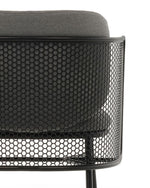 Black mesh chair with gray cushion on a white background