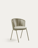A modern bucket-style chair with a woven slatted backrest and seat cushion in a light beige or greige color, supported by slim metal legs, shown against a plain off-white background.