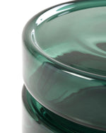 Close-up of a green glass bowl on a white background