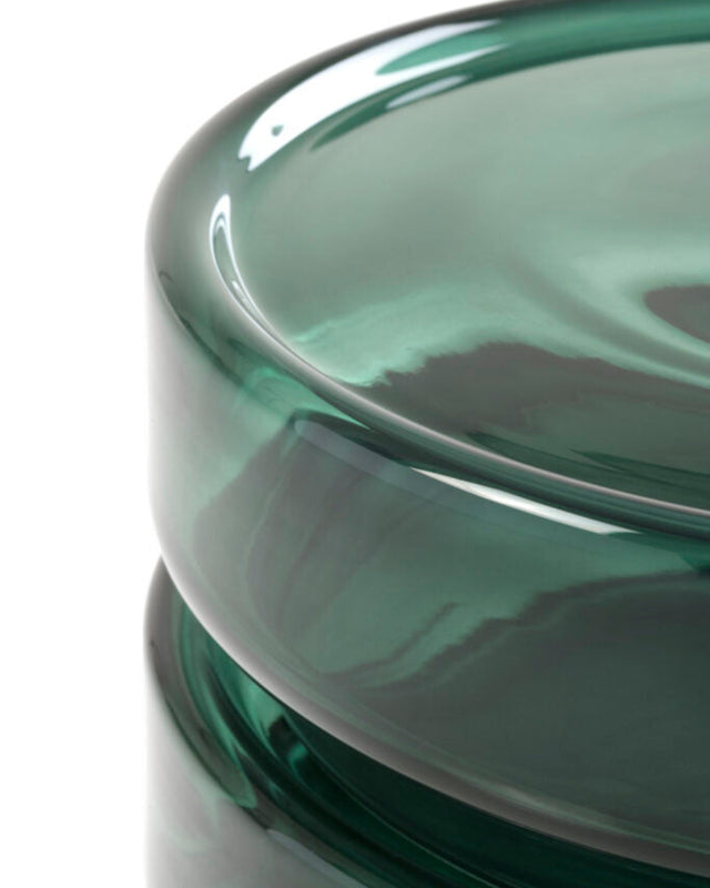 Close-up of a green glass bowl on a white background