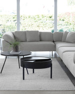 Arc Coffee Table with lid in black — clean, minimalist surface for display or decor.