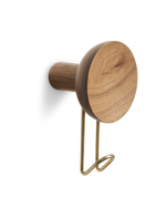 Around wall hanger in matte walnut with satin brass hook — large size from WOUD.