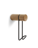 Around wall hanger in oak with black hook — small size from WOUD.