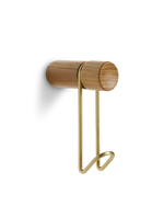 Around wall hanger in oak with satin brass hook — small size from WOUD.