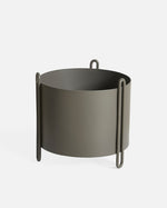 Pidestall Planter (Small) in taupe painted metal — modern indoor planter with cylindrical shape.