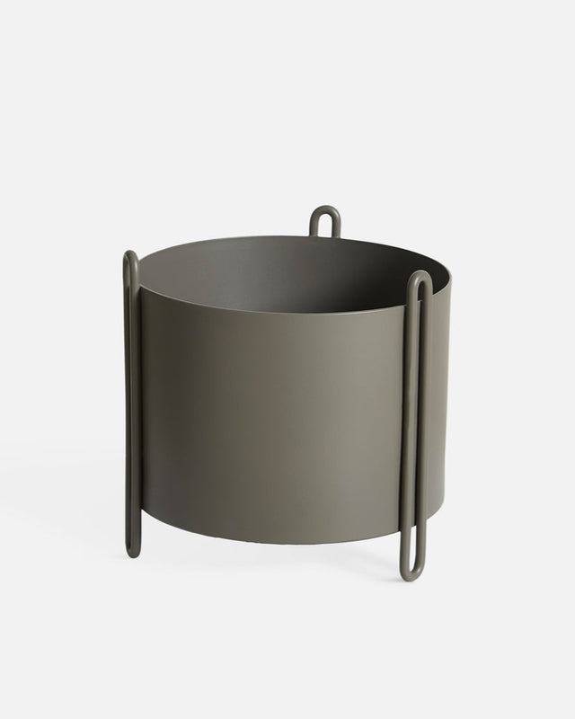 Pidestall Planter (Small) in taupe painted metal — modern indoor planter with cylindrical shape.