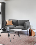 Sentrum Side Table styled in a modern living room — functional metal side table with built-in storage.