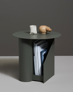 Close-up of painted metal surface finish of the Sentrum Side Table in dusty green.